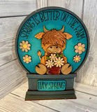 MDF highland cow spring snow globe