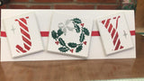 Christmas Card made from Stencil with letters J O Y , the O appears as a Christmas Wreath