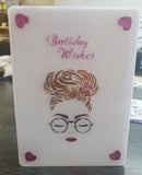 Zoe face Stencil with Glitter Frosting Paste made into a card