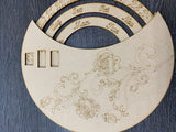 Rose Engraved Perpetual Calendar - show all parts in bare wood  with the engraved text and decoration ready to paint