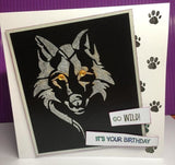 Wolf Stencil - Card showing Wolf head in solver on black with jewels for eyes 